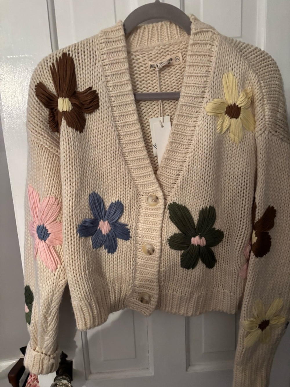 Blank NYC Cream Chunky Knit Cardigan with Multicolor Floral Appliqués